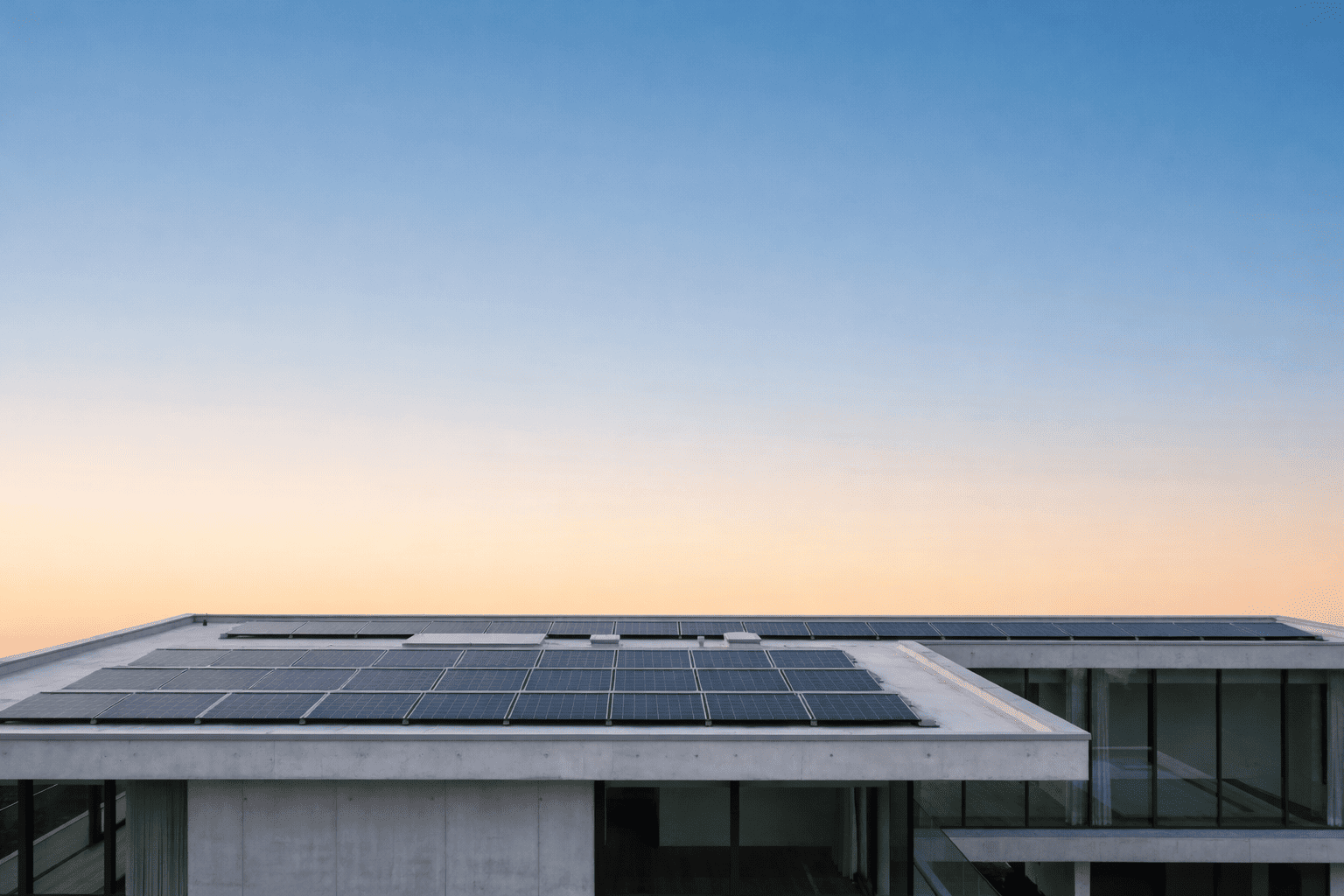 Solar panels installation on rooftop at sunset in Hyderabad